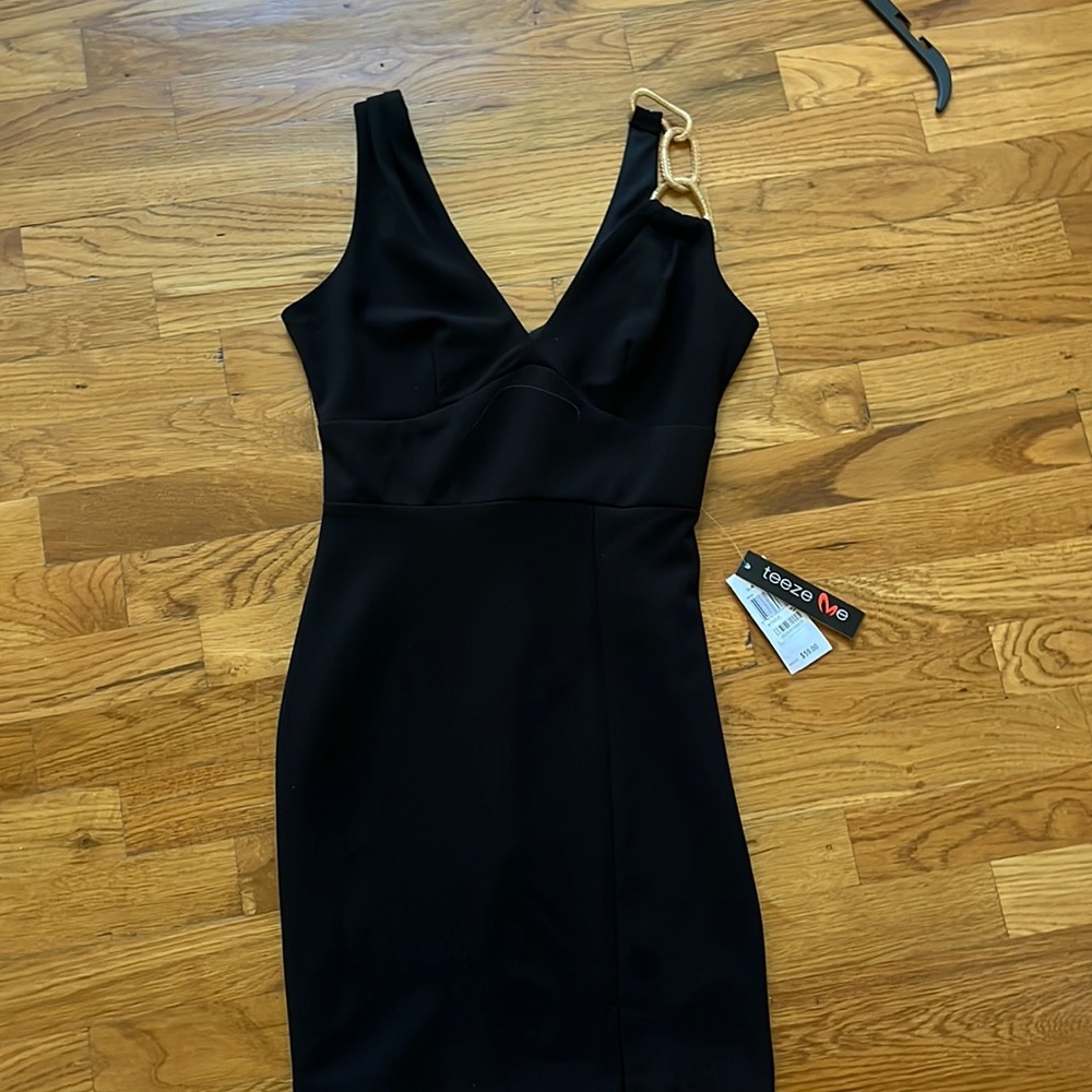 Black dress with gold shoulder